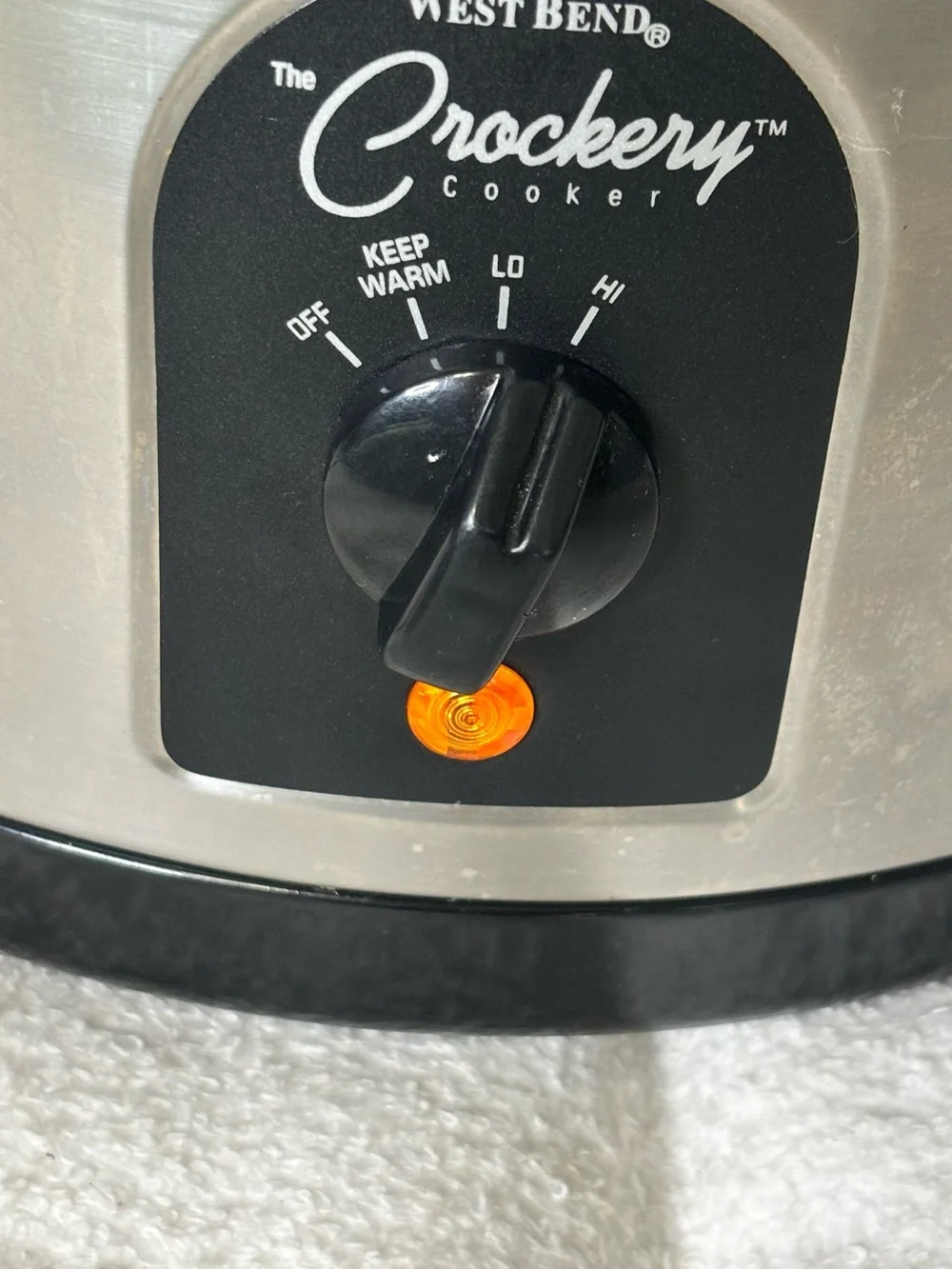West Bend Crockery Stainless Steel Slow Cooker in Black and Silver